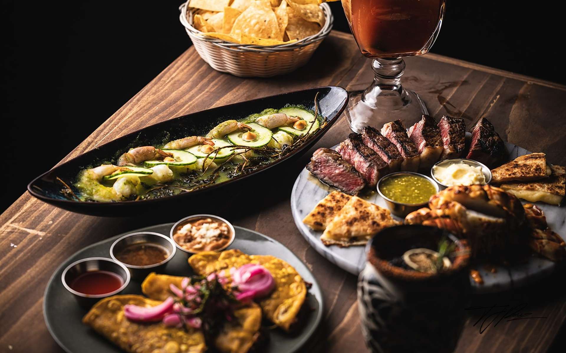 Vibrant dining atmosphere at Miel de Agave steakhouse.
