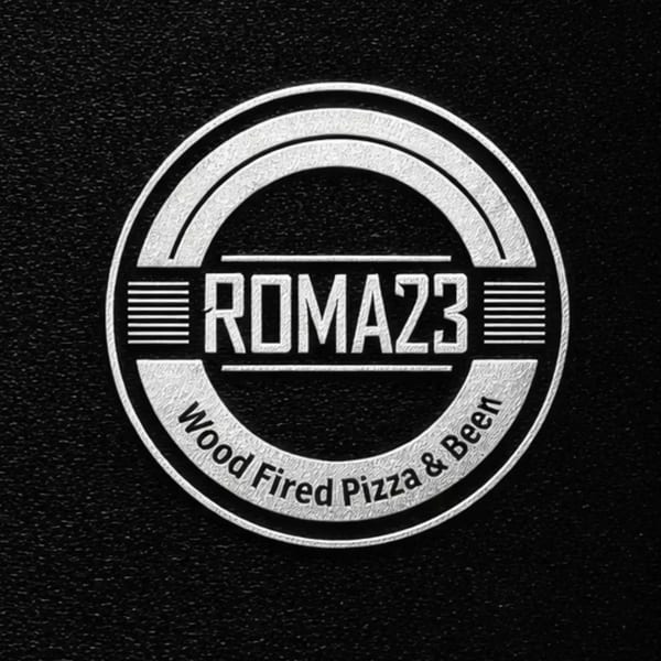 Silver Roma23 Wood Fired Pizza & Beer logo on a textured black background.